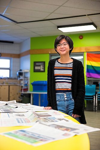 MIKAELA MACKENZIE / WINNIPEG FREE PRESS

Grade nine student Rory poses for a portrait with the Winnipeg Free Press, which is laid out in the common area every morning, at the Maples Met in Winnipeg on Friday, Jan. 24, 2020. For Melissa Martin story.
Winnipeg Free Press 2019.