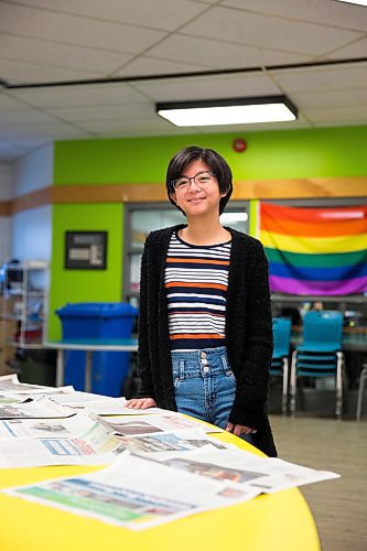 MIKAELA MACKENZIE / WINNIPEG FREE PRESS

Grade nine student Rory poses for a portrait with the Winnipeg Free Press, which is laid out in the common area every morning, at the Maples Met in Winnipeg on Friday, Jan. 24, 2020. For Melissa Martin story.
Winnipeg Free Press 2019.