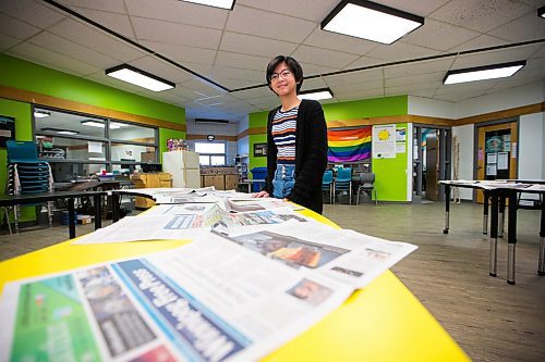 MIKAELA MACKENZIE / WINNIPEG FREE PRESS

Grade nine student Rory poses for a portrait with the Winnipeg Free Press, which is laid out in the common area every morning, at the Maples Met in Winnipeg on Friday, Jan. 24, 2020. For Melissa Martin story.
Winnipeg Free Press 2019.