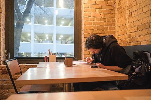 Mike Sudoma / Winnipeg Free Press
Animator, Jeremy Zazczek, works on a personal piece at Forth Coffee Shop Friday afternoon.
January 24, 2020