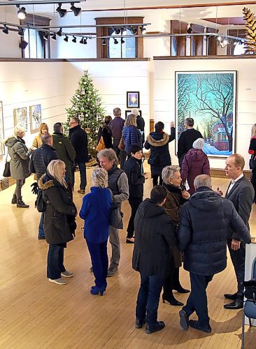 JASON HALSTEAD / WINNIPEG FREE PRESS

Attendees check out Wilf Perreault's painting There is Light on the Horizon at the annual Christmas Open House at the opening of Mayberry Fine Arts James and Barbara Burns Art Collection Exhibition and Sale in support of the CancerCare Manitoba Foundation and launch of the annual holiday open house exhibition at its Exhange District gallery on Dec. 8, 2019. (See Social Page)