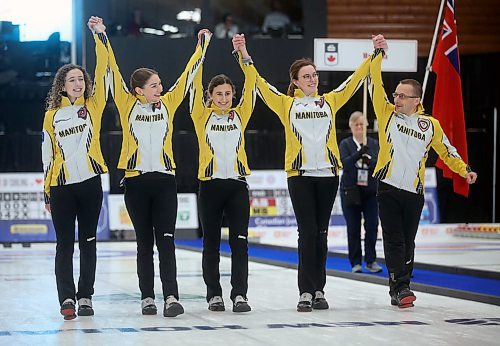 Team Manitoba's skip Mackenzie Zacharias, third Karlee Burgess, second Emily Zacharias, lead Lauren Lenentine and coach, Sheldon Zacharias celebrate after defeating Team Alberta in the final during the Canadian Junior Curling Championships in Langley, BC, Sunday, January 26, 2020. (TREVOR HAGAN / WINNIPEG FREE PRESS)