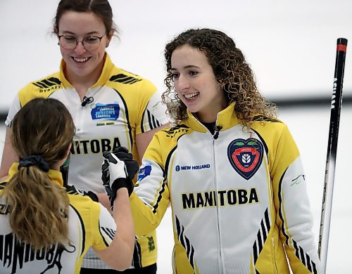 Team Manitoba's second Emily Zacharias lead Lauren Lenentine and skip Mackenzie Zacharias celebrate after Mackenzie hit for 4 against Team Alberta during the Canadian Junior Curling Championships in Langley, BC, Sunday, January 26, 2020. (TREVOR HAGAN / WINNIPEG FREE PRESS)