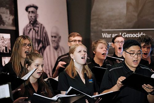 JOHN WOODS / WINNIPEG FREE PRESS
From left, Nina Hildebrandt, Katie Wright, and Jorrel Camuyong, of the Winnipeg Youth Choir, sing at the 75th anniversary of the liberation of Auschwitz at the CMHR in Winnipeg Sunday, January 26, 2020. 

Reporter: ?