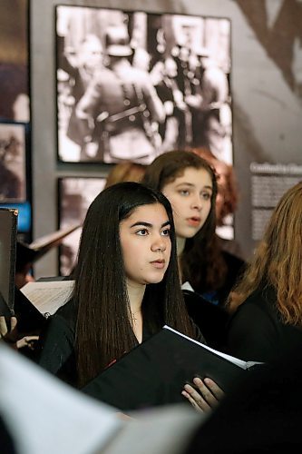 JOHN WOODS / WINNIPEG FREE PRESS
Mckenna Offerman, of the Winnipeg Youth Choir, sings at the 75th anniversary of the liberation of Auschwitz at the CMHR in Winnipeg Sunday, January 26, 2020. 

Reporter: ?