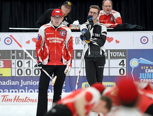 Team Manitoba's skip Jacques Gauthier looks on as Daniel Bruce, skip of team Newfoundland, instructs his sweepers, in the final during the Canadian Junior Curling Championships in Langley, BC, Sunday, January 26, 2020. (TREVOR HAGAN / WINNIPEG FREE PRESS)
