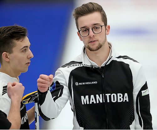 Team Manitoba's lead, Zack Bilawka and skip Jacques Gauthier while facing team Newfoundland in the final during the Canadian Junior Curling Championships in Langley, BC, Sunday, January 26, 2020. (TREVOR HAGAN / WINNIPEG FREE PRESS)