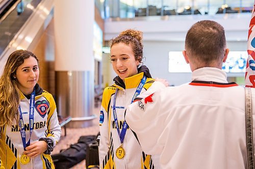 MIKAELA MACKENZIE / WINNIPEG FREE PRESS

Team Manitoba's women's skip Mackenzie Zacharias laughs while greeting family, friends, and fans at the airport in Winnipeg on Monday, Jan. 27, 2020. For Mike Sawatzky story.
Winnipeg Free Press 2019.