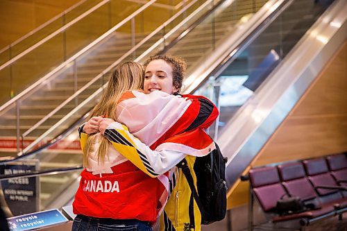 MIKAELA MACKENZIE / WINNIPEG FREE PRESS

Team Manitoba's women's skip Mackenzie Zacharias hugs Gaetanne Gauthier at the airport in Winnipeg on Monday, Jan. 27, 2020. For Mike Sawatzky story.
Winnipeg Free Press 2019.