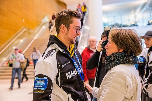 MIKAELA MACKENZIE / WINNIPEG FREE PRESS

Team Manitoba's men's skip Jacques Gauthier greets Patti Lund (coach's wife) at the airport in Winnipeg on Monday, Jan. 27, 2020. For Mike Sawatzky story.
Winnipeg Free Press 2019.