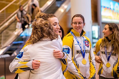 MIKAELA MACKENZIE / WINNIPEG FREE PRESS

Team Manitoba's women's skip Mackenzie Zacharias greets family, friends, and fans at the airport in Winnipeg on Monday, Jan. 27, 2020. For Mike Sawatzky story.
Winnipeg Free Press 2019.