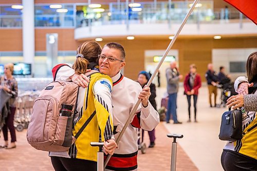 MIKAELA MACKENZIE / WINNIPEG FREE PRESS

Team Manitoba's women's lead Lauren Lenentine hugs Val Robinson at the airport in Winnipeg on Monday, Jan. 27, 2020. For Mike Sawatzky story.
Winnipeg Free Press 2019.