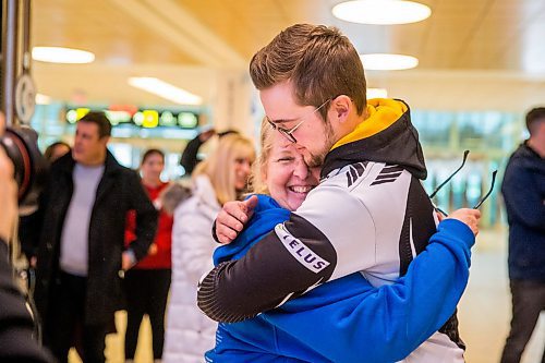 MIKAELA MACKENZIE / WINNIPEG FREE PRESS

Team Manitoba's men's skip Jacques Gauthier hugs his mom, Cathy Gauthier, at the airport in Winnipeg on Monday, Jan. 27, 2020. For Mike Sawatzky story.
Winnipeg Free Press 2019.