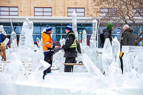 MIKAELA MACKENZIE / WINNIPEG FREE PRESS

Luca Roncoroni, ice designer (left), and Brian McArthur, ice artist, work on the stage for the Glacial performance at The Forks in Winnipeg on Wednesday, Jan. 29, 2020. For Erin Lebar story.
Winnipeg Free Press 2019.