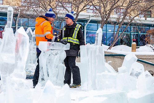 MIKAELA MACKENZIE / WINNIPEG FREE PRESS

Luca Roncoroni, ice designer (left), and Brian McArthur, ice artist, work on the stage for the Glacial performance at The Forks in Winnipeg on Wednesday, Jan. 29, 2020. For Erin Lebar story.
Winnipeg Free Press 2019.