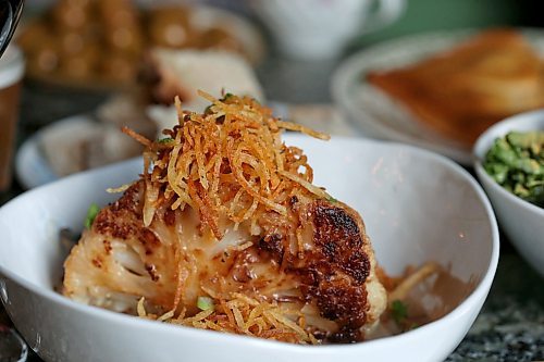 SHANNON VANRAES / WINNIPEG FREE PRESS
Roast cauliflower with mushroom gravy and crispy potato strips at The Roost Social Club on Wednesday, January 29, 2020. The restaurant features a primarily plant-based menu full of vegan and vegetarian dishes.