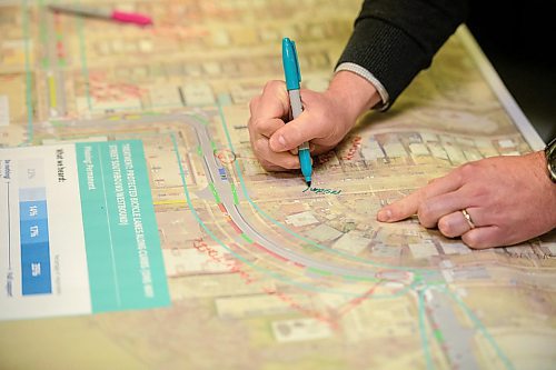 Mike Sudoma / Winnipeg Free Press
Erik Dickson of Urban Systems makes a note on a map of West Broadway during an information session regarding the proposed Downtown Walk Bike Project held at the Westminster Church Wednesday evening
January 29, 2020
