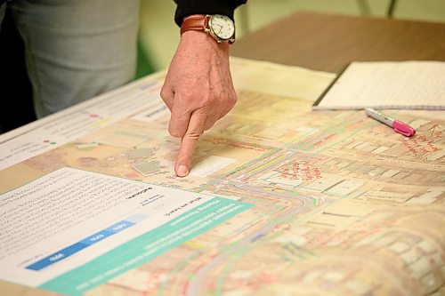 Mike Sudoma / Winnipeg Free Press
A persons finger points to a point on a map of West Broadway during an information session regarding the proposed Downtown Walk Bike Project held at the Westminster Church Wednesday evening
January 29, 2020