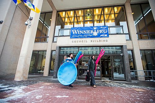 MIKAELA MACKENZIE / WINNIPEG FREE PRESS

Brendan Devlin (left) and John Samson, Budget for All Winnipeg members, leaves the lobby of City Hall holding beach toys after holding a "pool party" in protest of proposed budget cuts to city pools and recreation facilities in Winnipeg on Thursday, Jan. 30, 2020. For Danielle Da Silva story.
Winnipeg Free Press 2019.