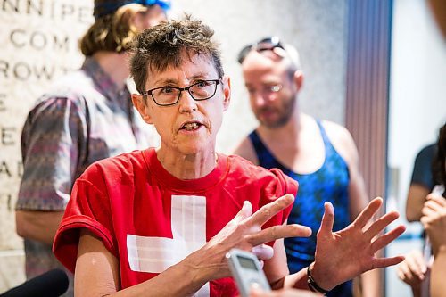 MIKAELA MACKENZIE / WINNIPEG FREE PRESS

Wendy Boyd, Budget for All Winnipeg member, speaks to media at a "pool party" in the lobby of City Hall in protest of proposed budget cuts to city pools and recreation facilities in Winnipeg on Thursday, Jan. 30, 2020. For Danielle Da Silva story.
Winnipeg Free Press 2019.