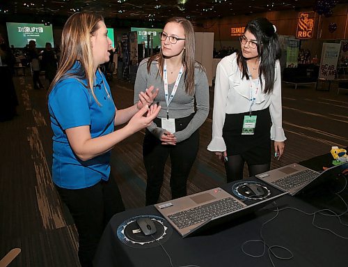 JASON HALSTEAD / WINNIPEG FREE PRESS

University College of the North business administration students Kellie Bickel (middle) and Charla McKenzie (right) chat with Michelle Chay, director/owner of Code Ninjas, at Tech Manitoba's Disrupted: The Human Side of Tech conference at the RBC Convention Centre Winnipeg on Jan. 30, 2020. (See Cash Story)