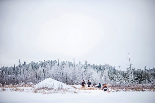 MIKAELA MACKENZIE / WINNIPEG FREE PRESS

Devin, Thomas, and Murray Imrie set a new beaver trap on their trapline near Falcon Lake, Manitoba on Tuesday, Jan. 28, 2020. 
Winnipeg Free Press 2019.