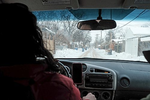 Mike Sudoma / Winnipeg Free Press
The founder and photographer of the growing Instagram account @shoppingcartsofwinnipeg, drives the West End neighbourhood Wednesday afternoon in search of interesting shopping carts, one of her favourite areas to do so.
January 29, 2020