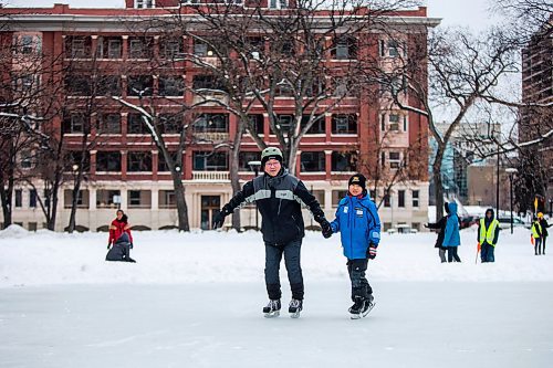 MIKAELA MACKENZIE / WINNIPEG FREE PRESS

James Gao holds onto his son, Jason (11), for balance at a newcomer skating class, hosted by the West End BIZ, in Central Park in Winnipeg on Friday, Jan. 31, 2020. Jason has been playing hockey for five years, but this is his dad's first time on skates in 25 years. Standup.
Winnipeg Free Press 2019.