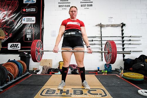 Daniel Crump / Winnipeg Free Press. Michelle Kymanick warms up for the deadlift competition during the Manitoba Powerlifting Association's largest¤annual meet at Brickhouse Gym on King Edward Street. February 1, 2020.