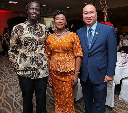 JASON HALSTEAD / WINNIPEG FREE PRESS

L-R: Mandela Kuet, Maggie Yeboah and MLA for Waverley Jon Reyes at the annual Stronger Together Dinner organized by the Ethnocultural Council of Manitoba  Stronger Together at Canad Inns Polo Park on Dec. 11, 2019. (See Social Page)