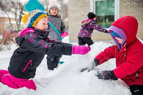 MIKAELA MACKENZIE / WINNIPEG FREE PRESS

Grade 2/3 students Hannah Moreau (left) and Holden Erickson build a snow pyramid at LaVerendrye School as part of the Jack Frost Challenge in Winnipeg on Monday, Feb. 3, 2020. The kids are practicing math estimating and measuring skills, and will make snow sculptures once the snow has solidified for a couple of days. Standup.
Winnipeg Free Press 2019.