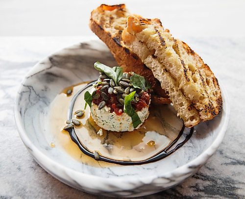 MIKE DEAL / WINNIPEG FREE PRESS
Gusto North in the Hargrave St. Market, 242 Hargrave, 2nd floor.
Ricotta Della Piazza 
San Mariano tomato jam, chili oil, pumpkin seeds, basil, and grilled sour dough.
200203 - Monday, February 03, 2020.