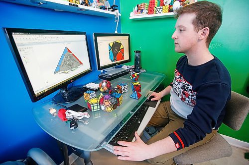 JOHN WOODS / WINNIPEG FREE PRESS
Braden Ganetsky is a puzzle creator and has a 3D printer in his bedroom, and has sold his creations online, is photographed in his Winnipeg bedroom Monday, February 3, 2020. 

Reporter: ?