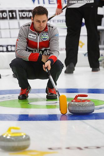 MIKE DEAL / WINNIPEG FREE PRESS
Third, Kyle Kurz, lines up a shot for skip Braden Calvert during their match against Team Gitzel at Eric Coy Arena Wednesday afternoon on day one of the 2020 Viterra Curling Championship.
200205 - Wednesday, February 05, 2020.