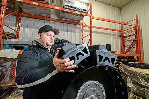 Mike Sudoma / Winnipeg Free Press
Evolution Wheel Owner, Derek Hird, assembles a skid steer tire using his patented non marking tire segments in the Evolution Tire Workshop Wednesday afternoon.
February 5, 2020