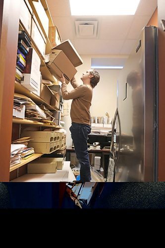 RUTH BONNEVILLE / WINNIPEG FREE PRESS
FAITH - Religious archives story for 49.8
Archivist, Andrew Morrison, stands on a stool in a room full of newly received documents that still need to be organized and archived.
STORY INFO: At the Jewish Heritage Centre, executive director Belle Jarniewski also struggles to find space for the many items in the collectionmore than 70,000 photos, 1,300 sound and moving image recordings, 1,000 textual records, 200 bound volumes of newspapers, and over 4,000 artefacts."
They have hired a part-time archivist (Andrew Morrison) to handle all the new incoming documents but it's not enough to keep up.
See story by John Longhurst
Feb 5th, 2020