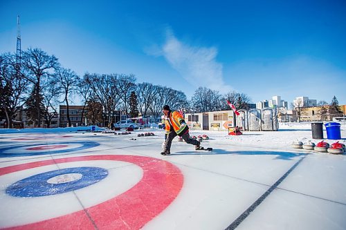 MIKAELA MACKENZIE / WINNIPEG FREE PRESS

Volunteer Mike Sokil throws some rocks for fun after setting up for the Ironman Outdoor Curling Bonspiel in Memorial Park in Winnipeg on Friday, Feb. 7, 2020. 
Winnipeg Free Press 2019.