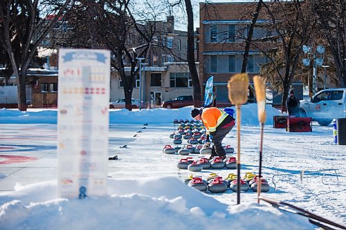 MIKAELA MACKENZIE / WINNIPEG FREE PRESS

Volunteer Mike Sokil throws some rocks for fun after setting up for the Ironman Outdoor Curling Bonspiel in Memorial Park in Winnipeg on Friday, Feb. 7, 2020. 
Winnipeg Free Press 2019.