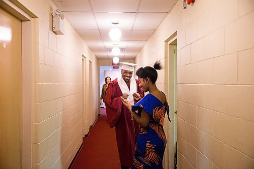 MIKAELA MACKENZIE / WINNIPEG FREE PRESS

Graduate Daniel Pembele dances with friend Plamedie Gatoro before the first-ever Freedom International School (a Christian private school for at-risk refugee students) graduation in Winnipeg on Friday, Feb. 7, 2020.  For Maggie Macintosh story.
Winnipeg Free Press 2019.