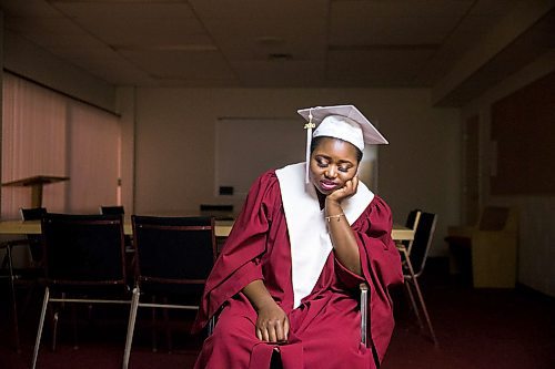 MIKAELA MACKENZIE / WINNIPEG FREE PRESS

Graduate Devotha Kwizera waits for the first-ever Freedom International School (a Christian private school for at-risk refugee students) graduation to start in Winnipeg on Friday, Feb. 7, 2020.  For Maggie Macintosh story.
Winnipeg Free Press 2019.