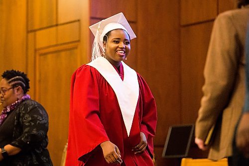 MIKAELA MACKENZIE / WINNIPEG FREE PRESS

Graduate Devotha Kwizera walks across the stage at the first-ever Freedom International School (a Christian private school for at-risk refugee students) graduation in Winnipeg on Friday, Feb. 7, 2020.  For Maggie Macintosh story.
Winnipeg Free Press 2019.