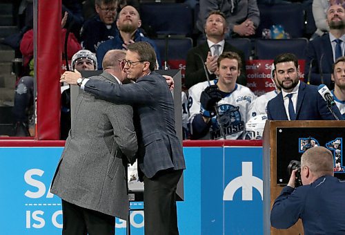 SHANNON VANRAES / WINNIPEG FREE PRESS
Jimmy Roy is embraced by Mark Chapman, chairman of True North Sports & Entertainment, at ceremony to retire his jersey number at Bell MTS Place on February 7, 2020.