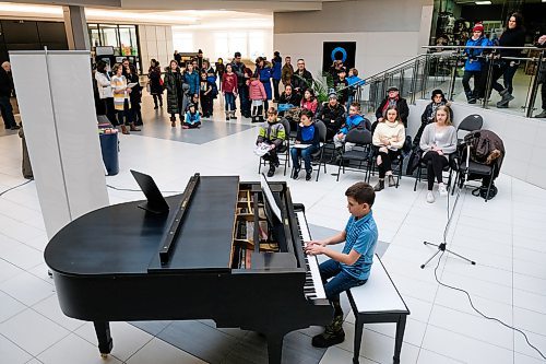 Daniel Crump / Winnipeg Free Press. A student plays piano during the annual Musicthon fundraising event, collecting¤pledges to support Little Miracles Music and Play and Tiny Tunes early-years music programs. Both programs¤help kids in the inner city and other lower-income areas where families often do not have the funds or access to early childhood music programs. February 8, 2020.