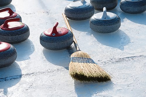 Mike Sudoma / Winnipeg Free Press
Curling rocks and broom on the ice of the Ironman Outdoor Curling Bonspiel Sunday morning on Memorial Blvd
February 9, 2020