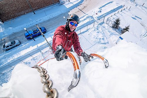 Mike Sudoma / Winnipeg Free Press
Rob Knight puts his ice pic into the ice as he makes it to the top of the 60ft Ice Structure along Rue Messager in St Boniface as the St Boniface Apline Club go for a Sunday morning climb
February 9, 2020