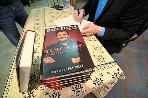 Mike Sudoma / Winnipeg Free Press
Eddie Olczyk signs copies of his book Beating the Odds for a fan at McNally Robinson Sunday afternoon
February 9, 2020