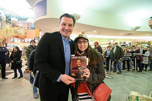 Mike Sudoma / Winnipeg Free Press
Eddie Olczyk with fan, Alex Miki during book signing promoting his book Beating the Odds at McNally Robinson Sunday afternoon
February 9, 2020