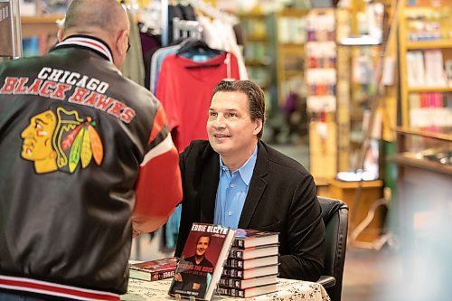 Mike Sudoma / Winnipeg Free Press
Eddie Olczyk signing a copy of his book Beating the Odds for a fan during book a signing promoting his book at McNally Robinson Sunday afternoon
February 9, 2020