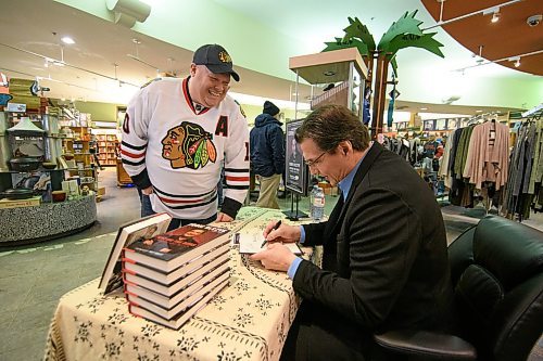 Mike Sudoma / Winnipeg Free Press
Eddie Olczyk signs copies of his book Beating the Odds for fan, David Moyse at McNally Robinson Sunday afternoon
February 9, 2020