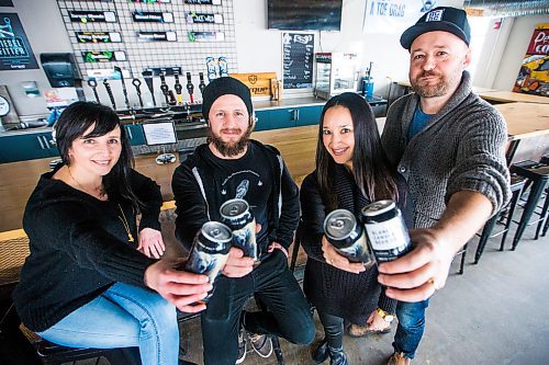 MIKAELA MACKENZIE / WINNIPEG FREE PRESS

Artist Kal Barteski (left), brewer Perry Joyal, and husband-and-wife team Jenna Khan and Brad Chute pose with the new Arctic Stout at Torque Brewing Co in Winnipeg on Monday, Feb. 10, 2020. The special edition beer is part of Blank Canvas Beer Co., which brings artists and brewers together. For Ben MacPhee-Sigurdson story.
Winnipeg Free Press 2019.